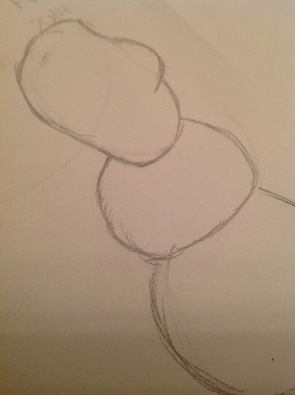 Draw a closed oval with a curve on the right