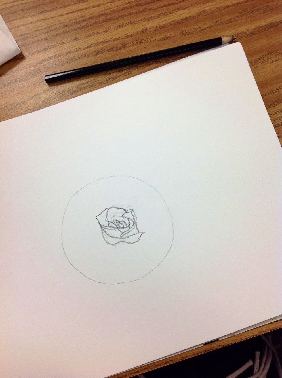 Draw a core spiral, that your petals will come off of. (Pencil) play with it until you are pleased with it.