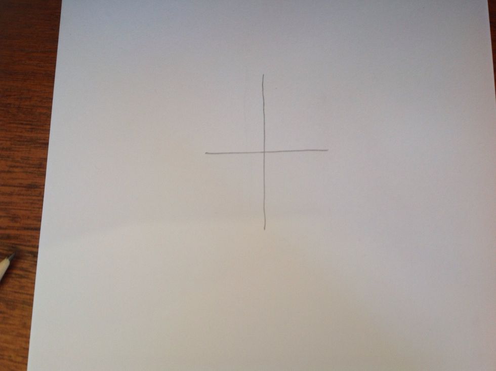 Draw a cross at the top of the page.