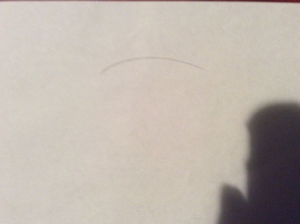 Draw a curved line that arches upwards slightly.