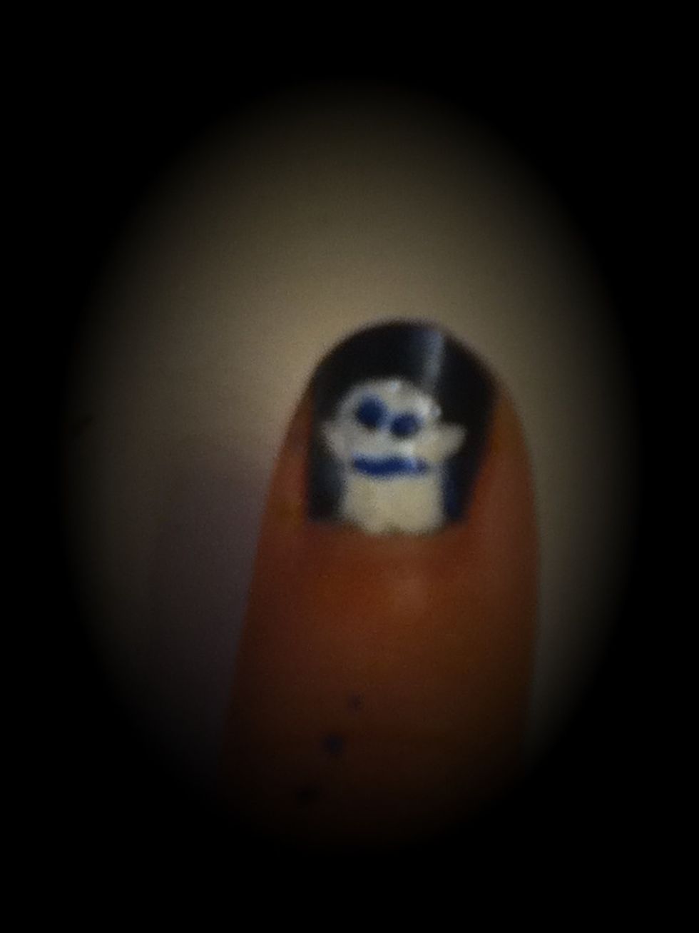 Draw a face on your little ghost for some added cuteness. Mine is a bit mad, but it could have any expression. Uneven faces are very cute as well.