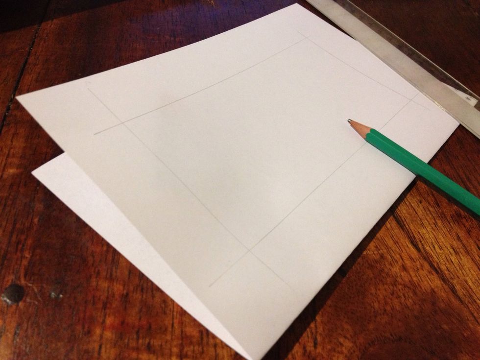 Draw a frame in the front of the sheet folded previously