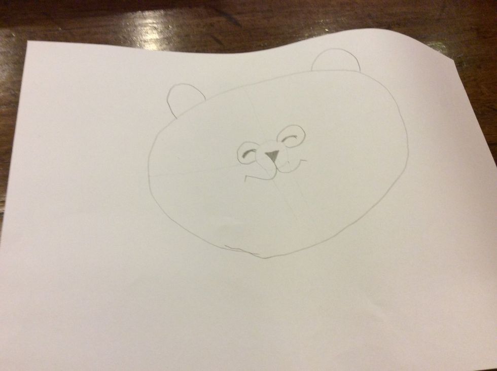 Draw a half circle with a short line on the side and draw that on both sides.