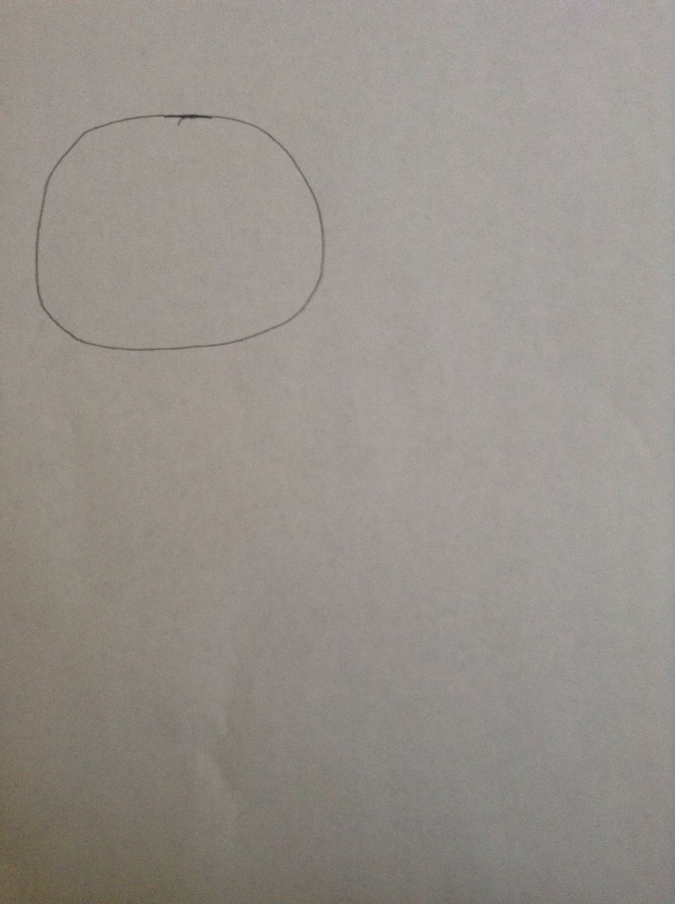 Draw a head slightly to the left of the page
