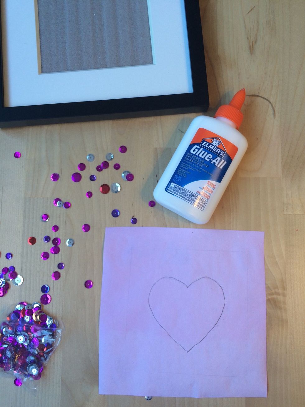 Draw a heart outline on your paper.