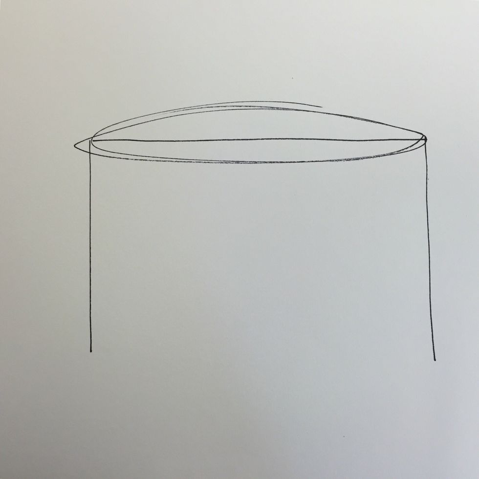 Draw a horizontal line to divide the oval in 1/2.