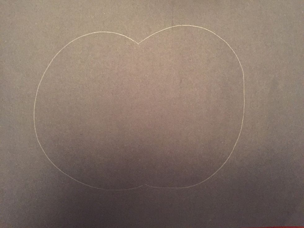 Draw a large backward C on the right side of your paper.