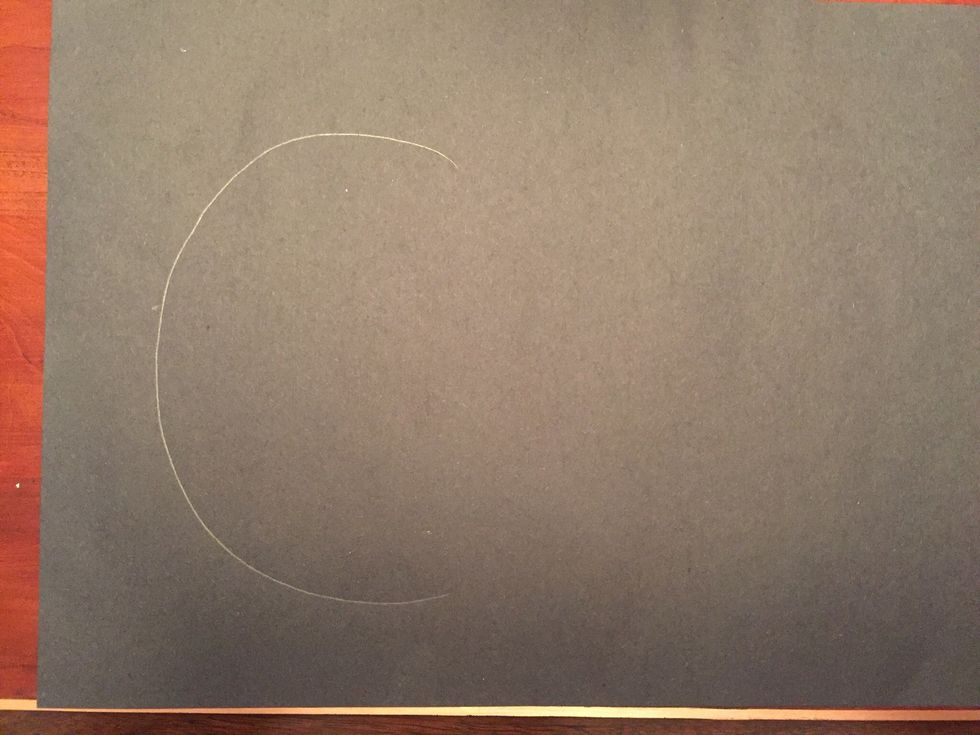 Draw a large C on the left of your paper with pencil.