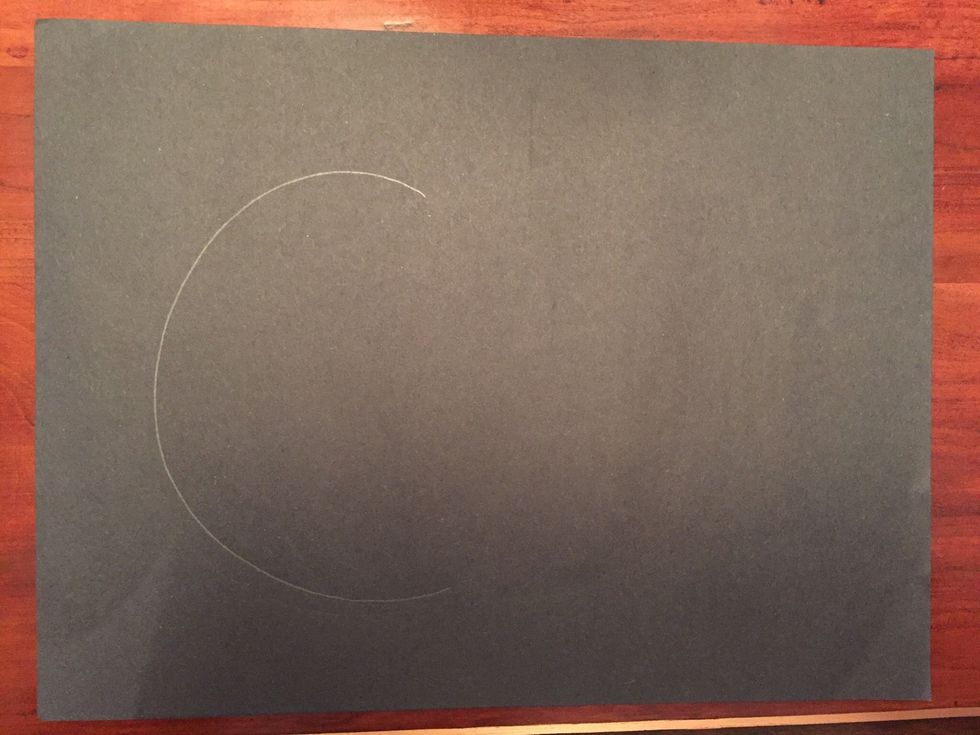 Draw a large C on the left side of your paper with pencil.