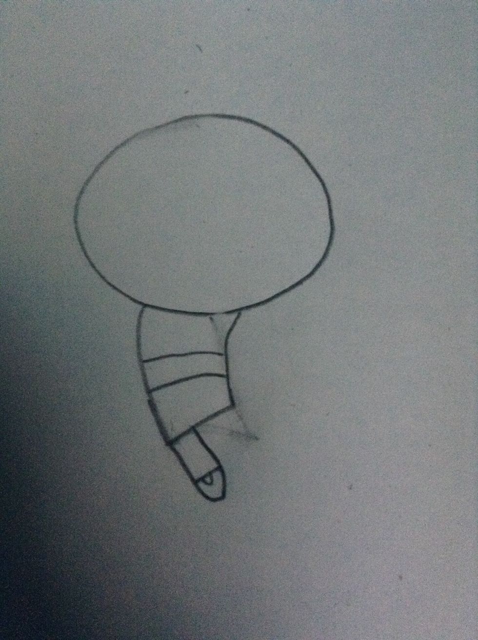 Draw a leg and a shoe. To do the shoe, make a line across the leg and a half circle inside