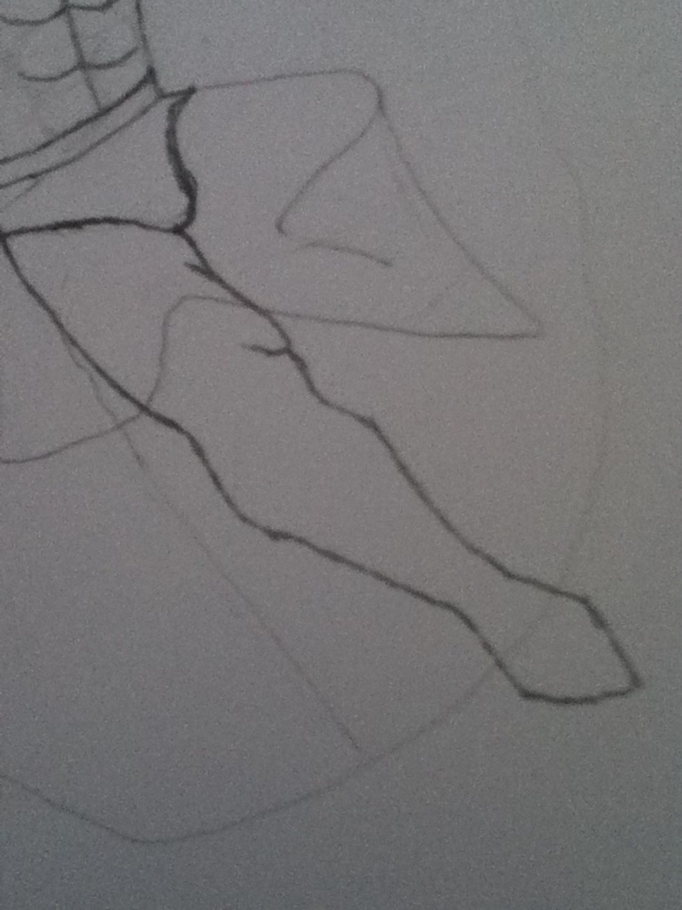 Draw a leg like this the lump indicates his knee and the other points are going to be guidelines for his shoes