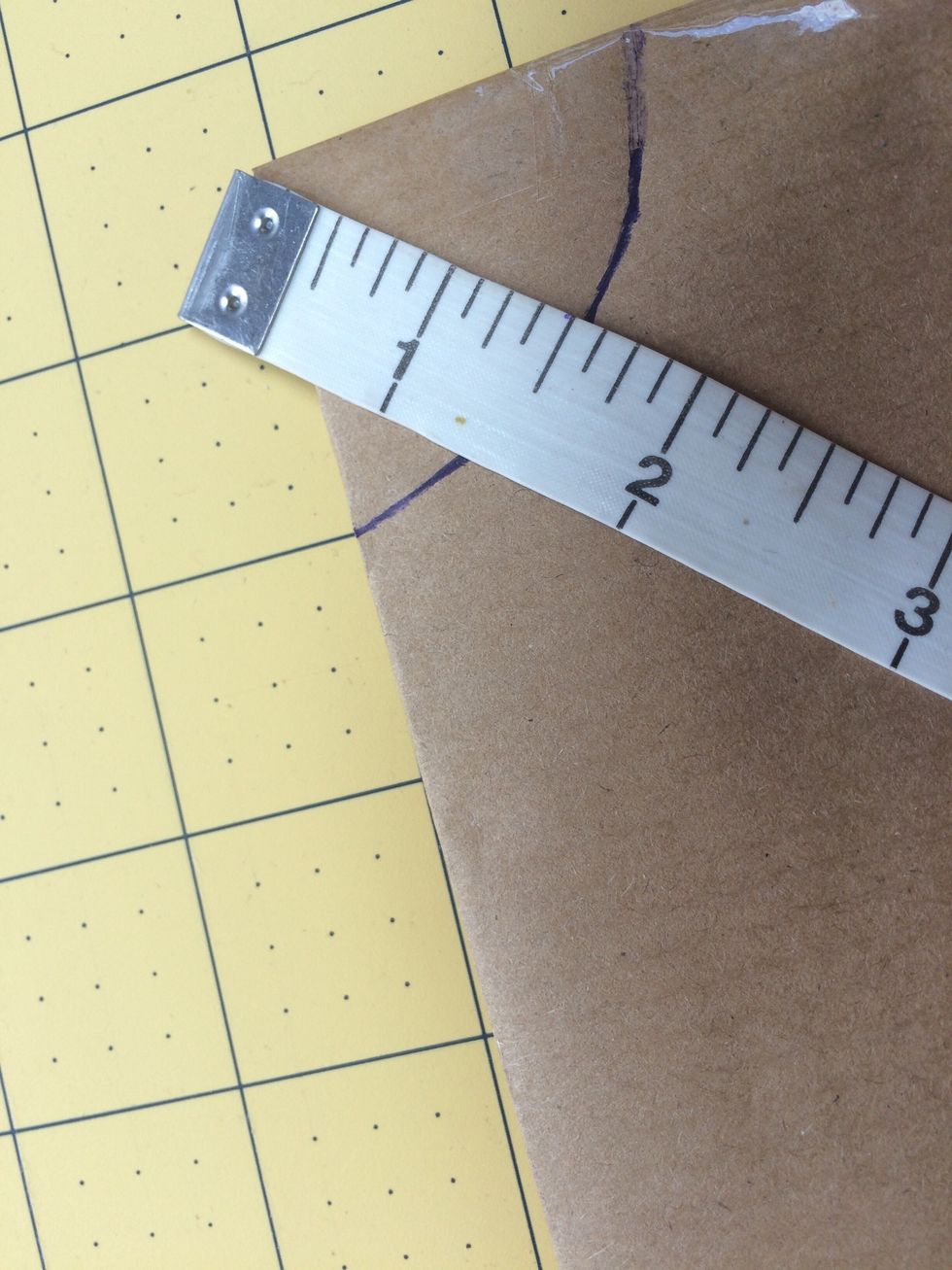 Draw a line 1.5 inches down from folded corner