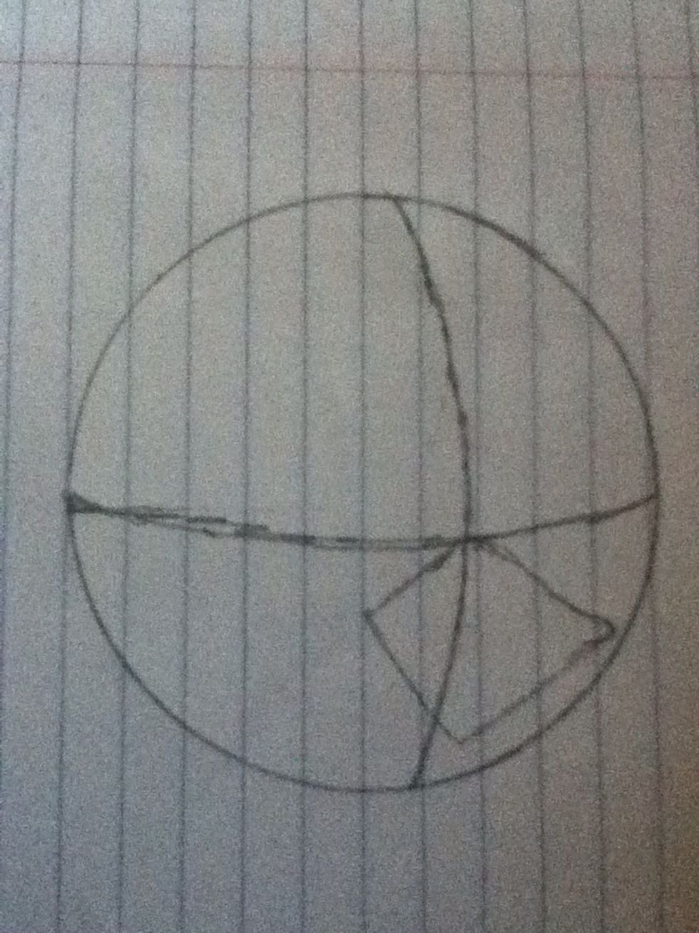 Draw a line across the circle like the one above. Then draw a diamond shaped thing which later would be a beak.