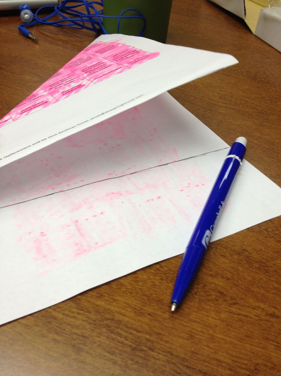 Draw a line along the bottom. Unfold.