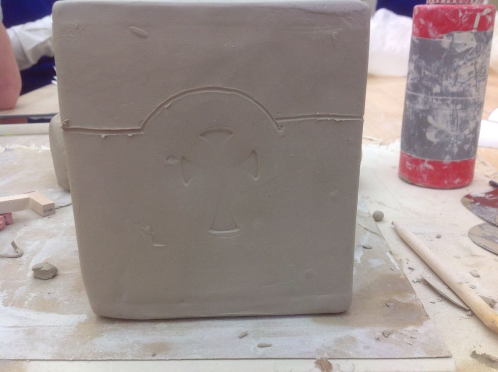 Draw a line around the box to mark where the lid will be cut.