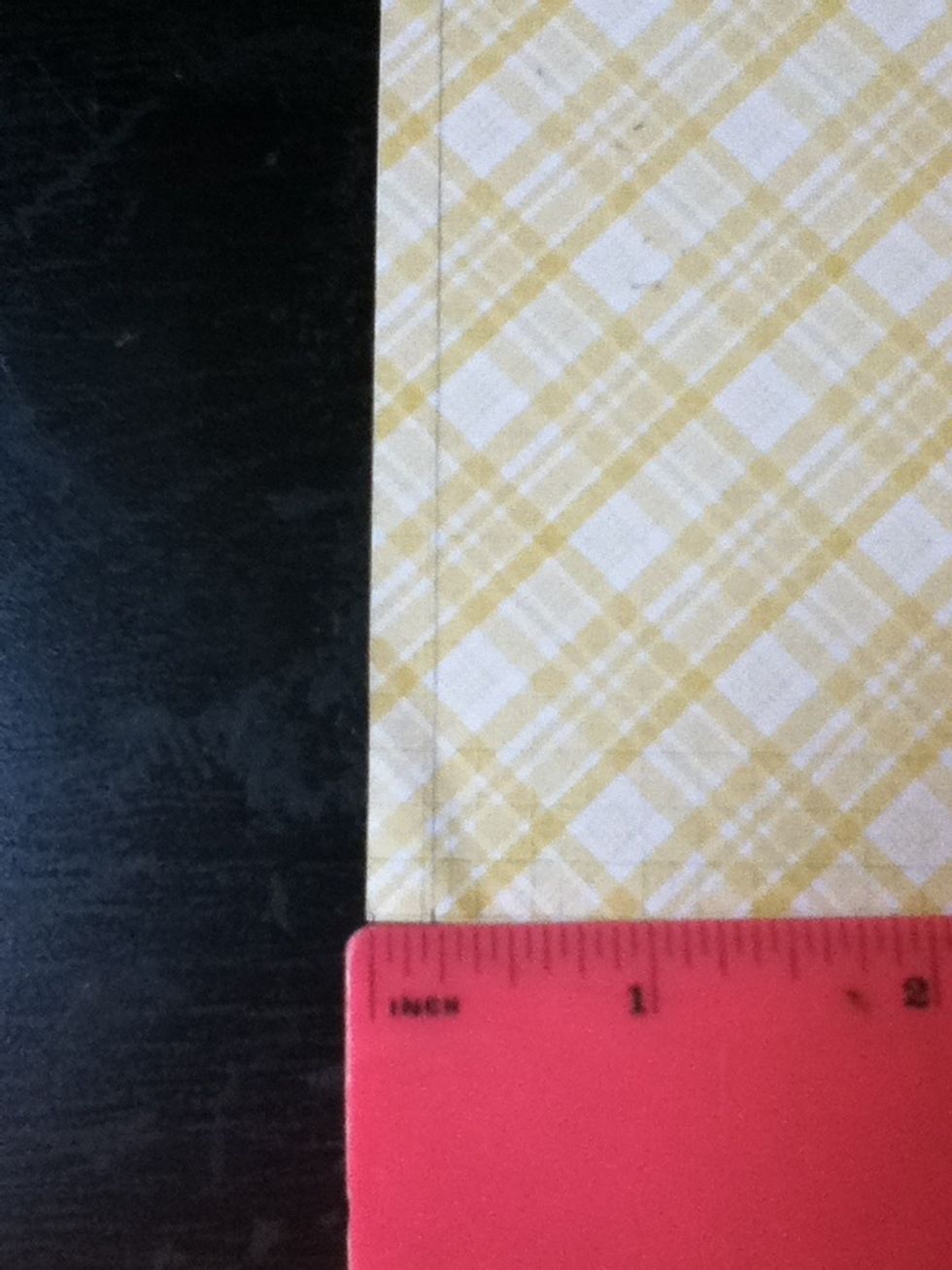 Draw a line as far from the edge of the paper as your measurement( so mine was a line 1/4" in.)
