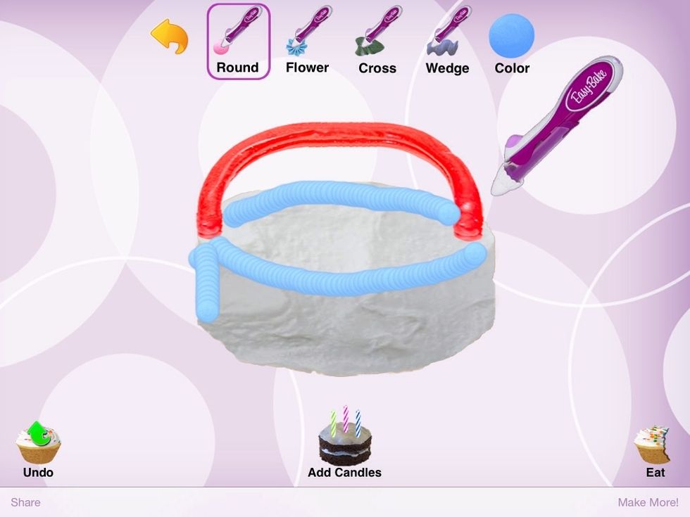 Draw a line down on the left side of the cake.