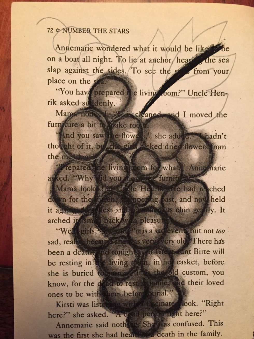 Draw a line down your leaf.