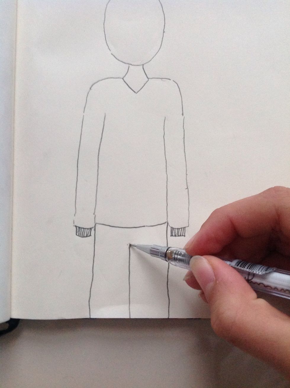 Draw a line in the middle to make two legs....