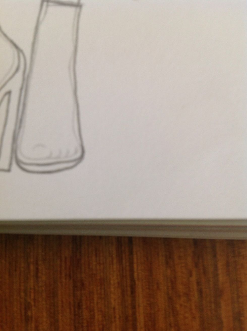 Draw a line underneath the fat sock. This is the shoe sole