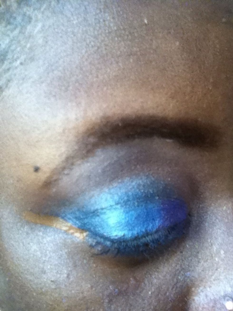 Draw a line where the eyeshadow should stop and clean up around the eye and brow