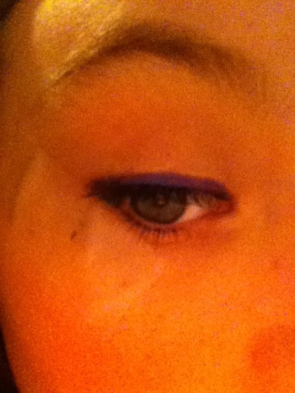 Draw a line with it above the black eyeliner :)