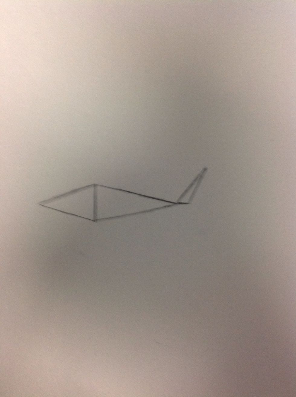 Draw a long skinny triangle touching tips with the triangle on the right.