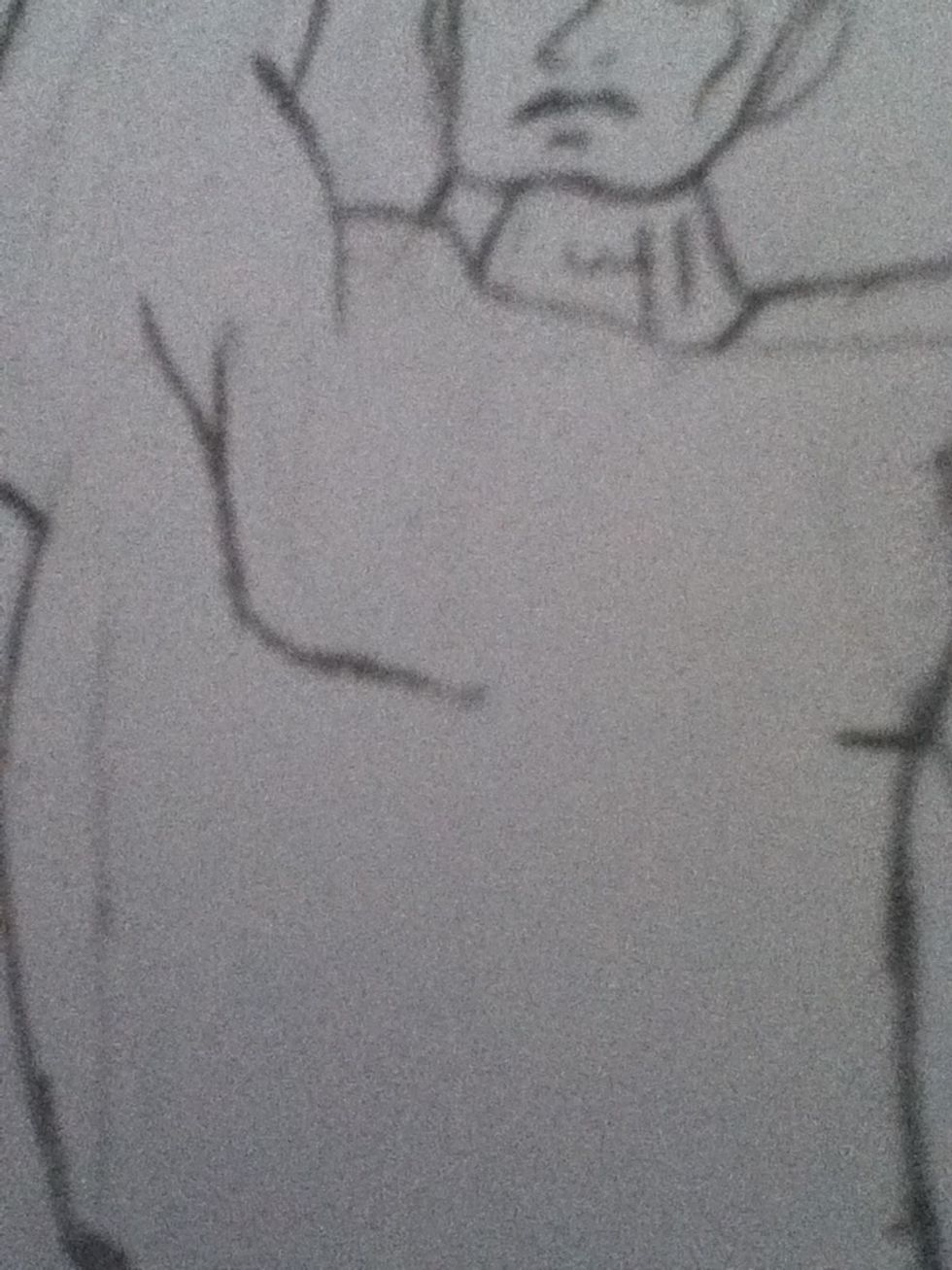 Draw a long y just under his shoulder