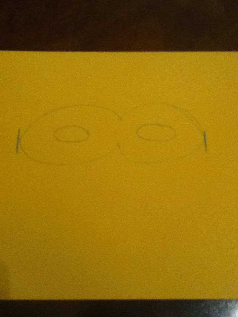 Draw a mask shape on the card stock. It should be a larger than half the paper.