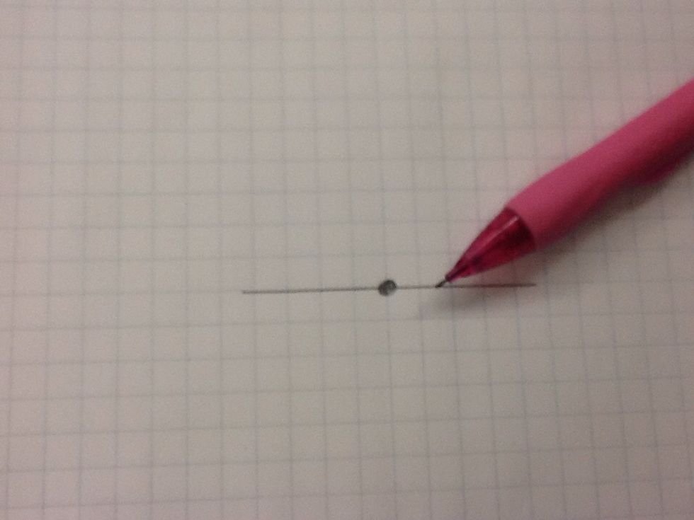 Draw a medium size dot in the middle of the line