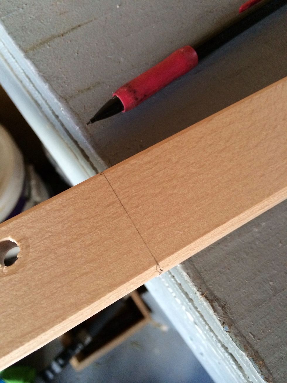 Draw a pencil line across to ensure a level cut.