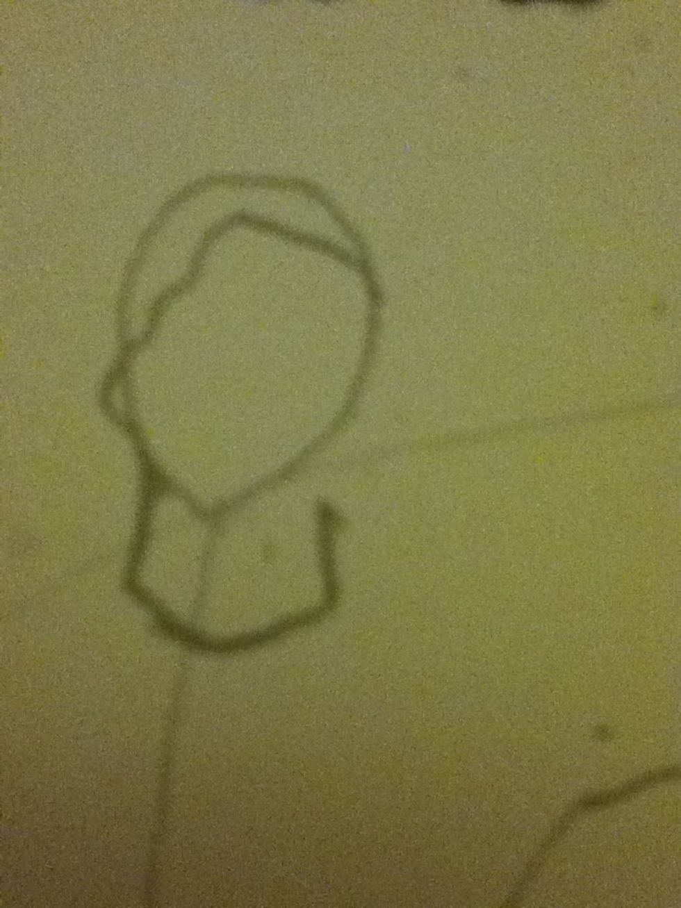 Draw a rectangle that kind of looks like its bent in half for his wrists and a sort of wiggly line for his knuckles or you can draw a straight line and add the knuckles later