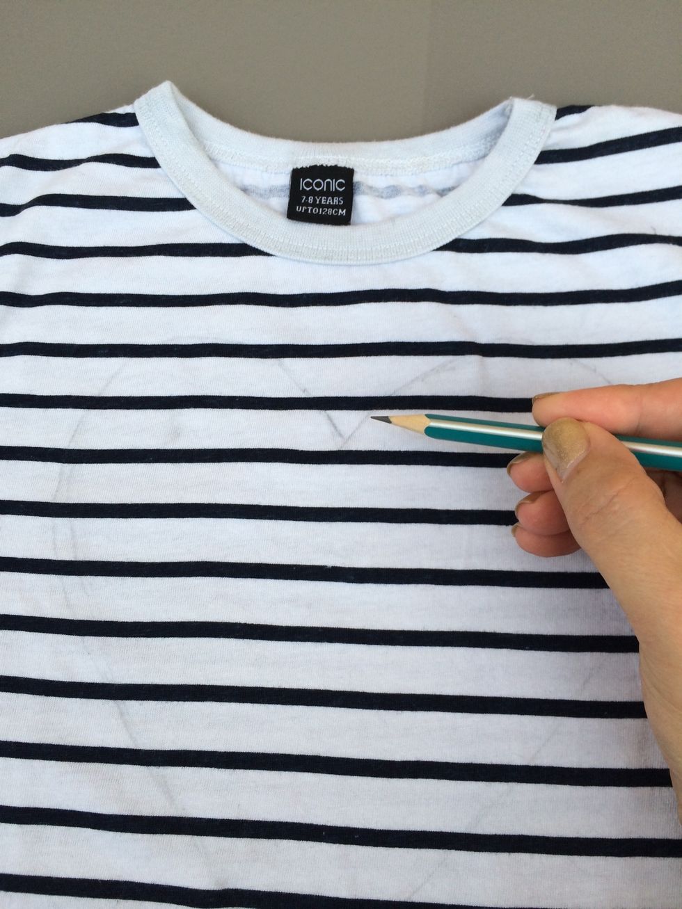 Draw a shape that you like in front panel of your T-shirt.