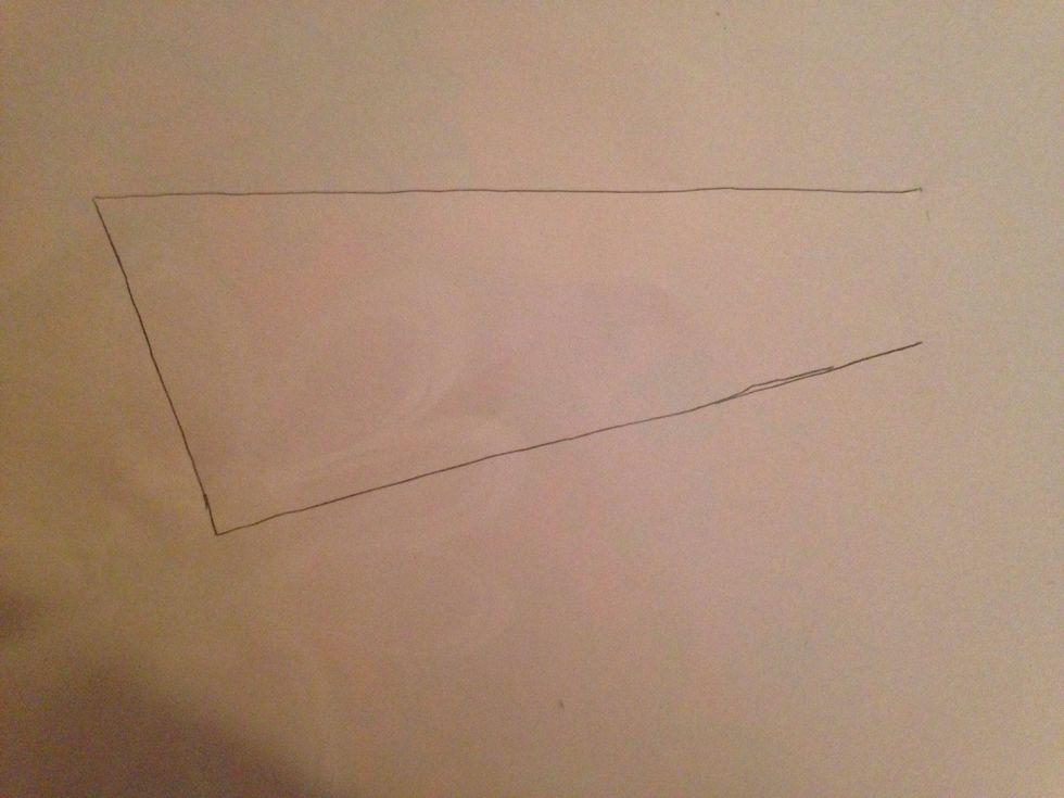 Draw a slanted up from the slanted side and under the straight one