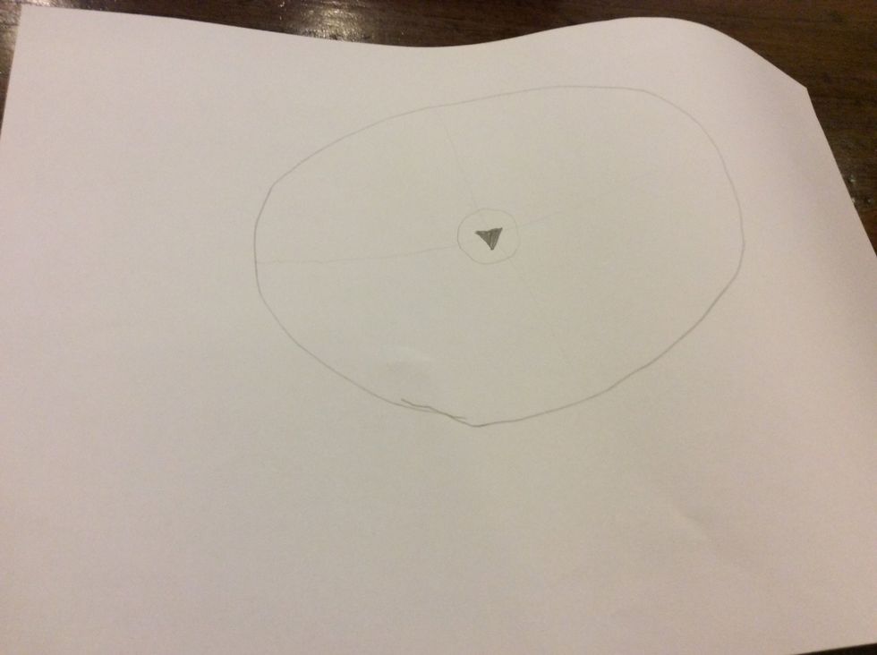 Draw a small triangle in the circle.