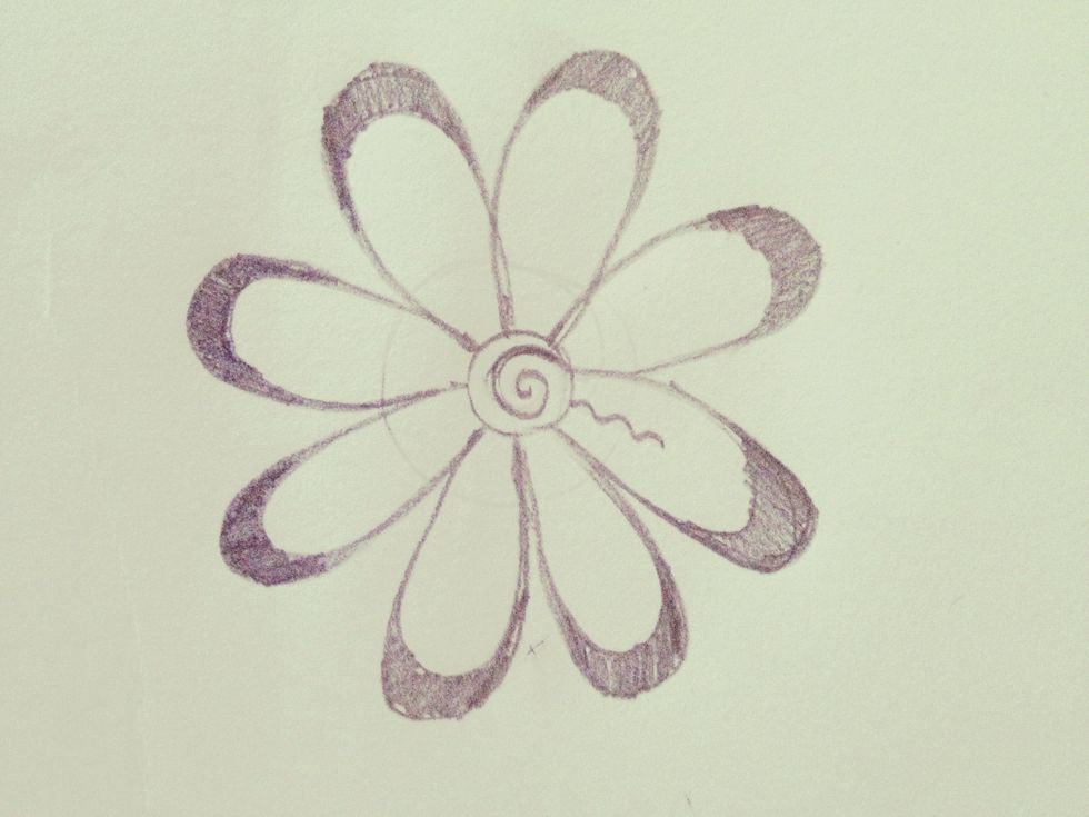 Draw a squiggly line inside the petal, like this. Go about halfway up the petal.