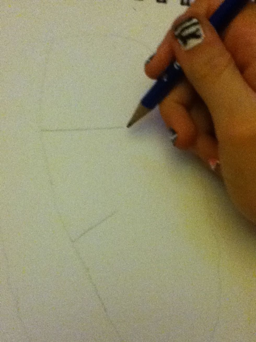 Draw a straight line part way down the line you just drew, this will be his shoulders and another line shorter and at an angle this will be where his legs start