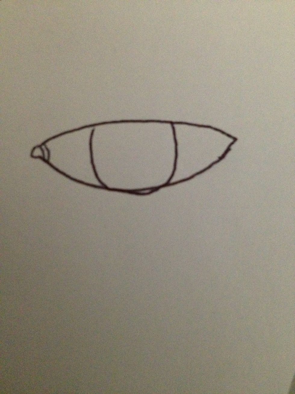 Draw a U in the eye.