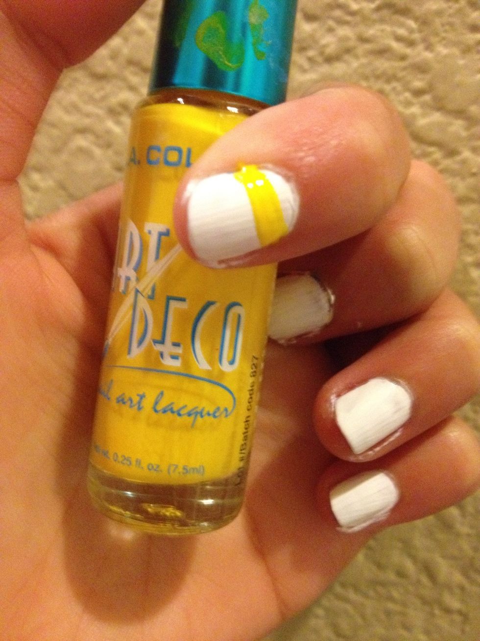 Draw a yellow stripe on your nail;) it can be as thick or as thin as you want it;)
