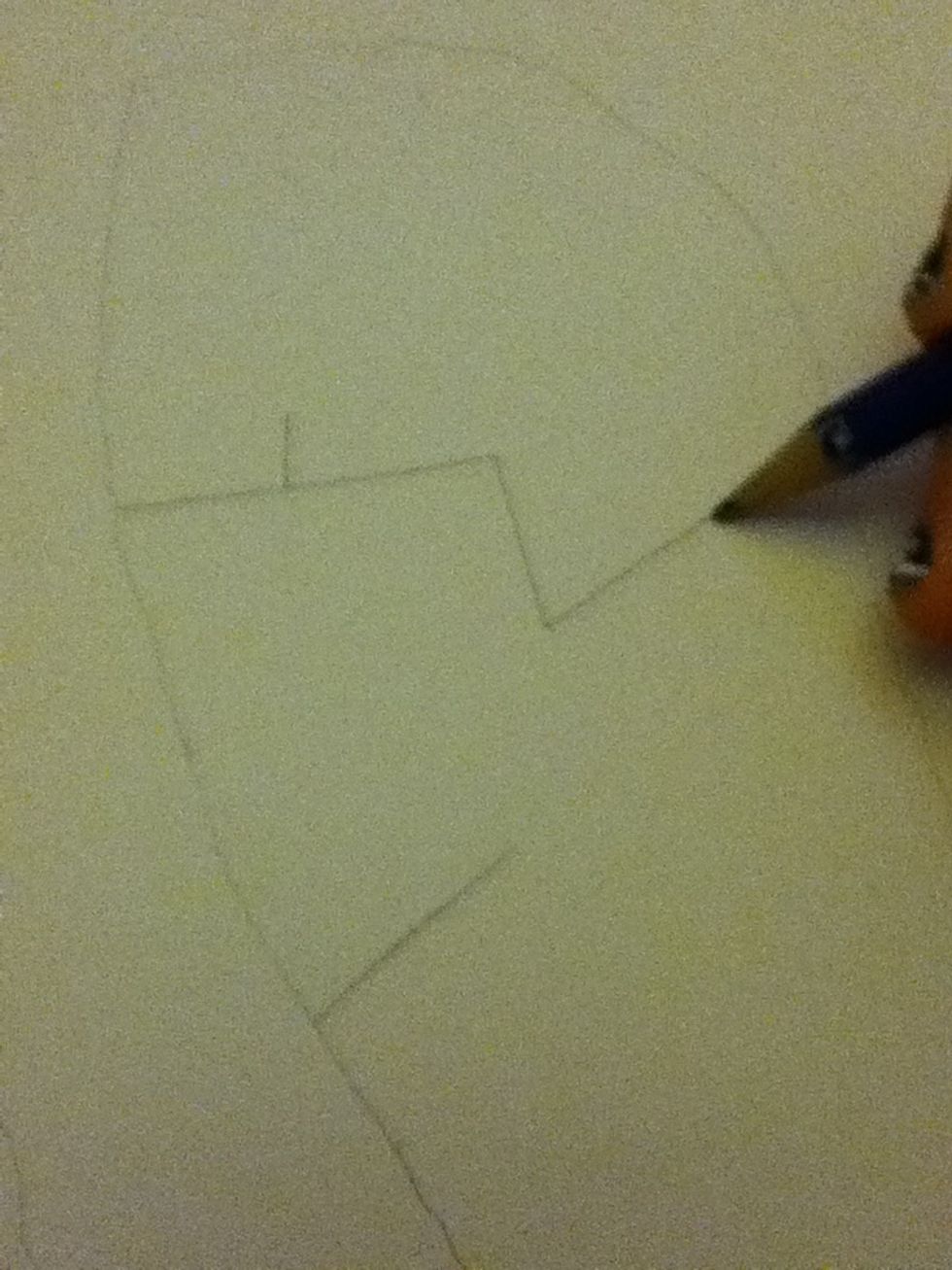 Draw a zig-zag for his arm at the end of his shoulder and a short line in the middle for his neck