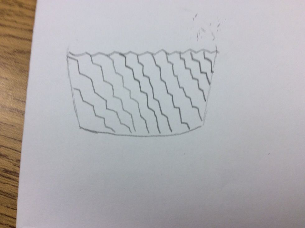 Draw a zig zag pattern on the muffin tin