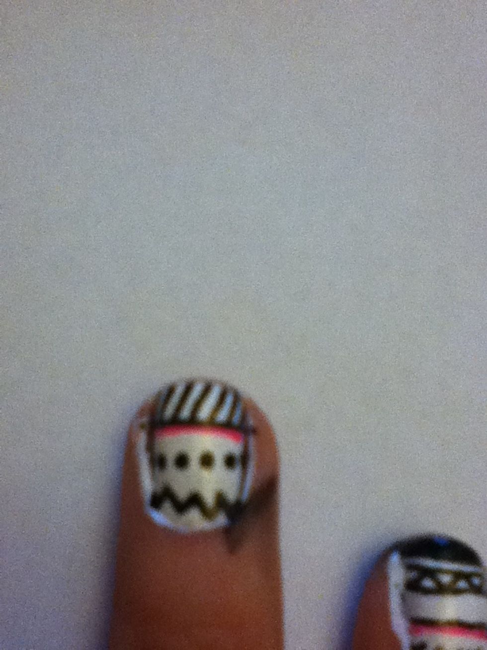 Draw a zigzag toward the bottom of the nail.