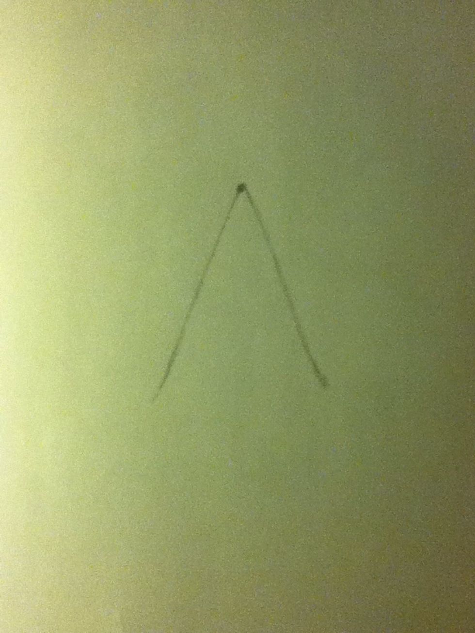 Draw an isosceles triangle using a reference point as the tip. Erase the bottom of the triangle.