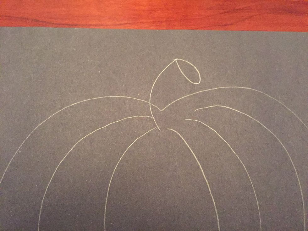 Draw an oval attached to the short curved line.