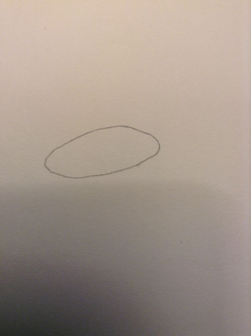 draw an oval, in the "tilted way" u want your flower. if that makes any sense:)