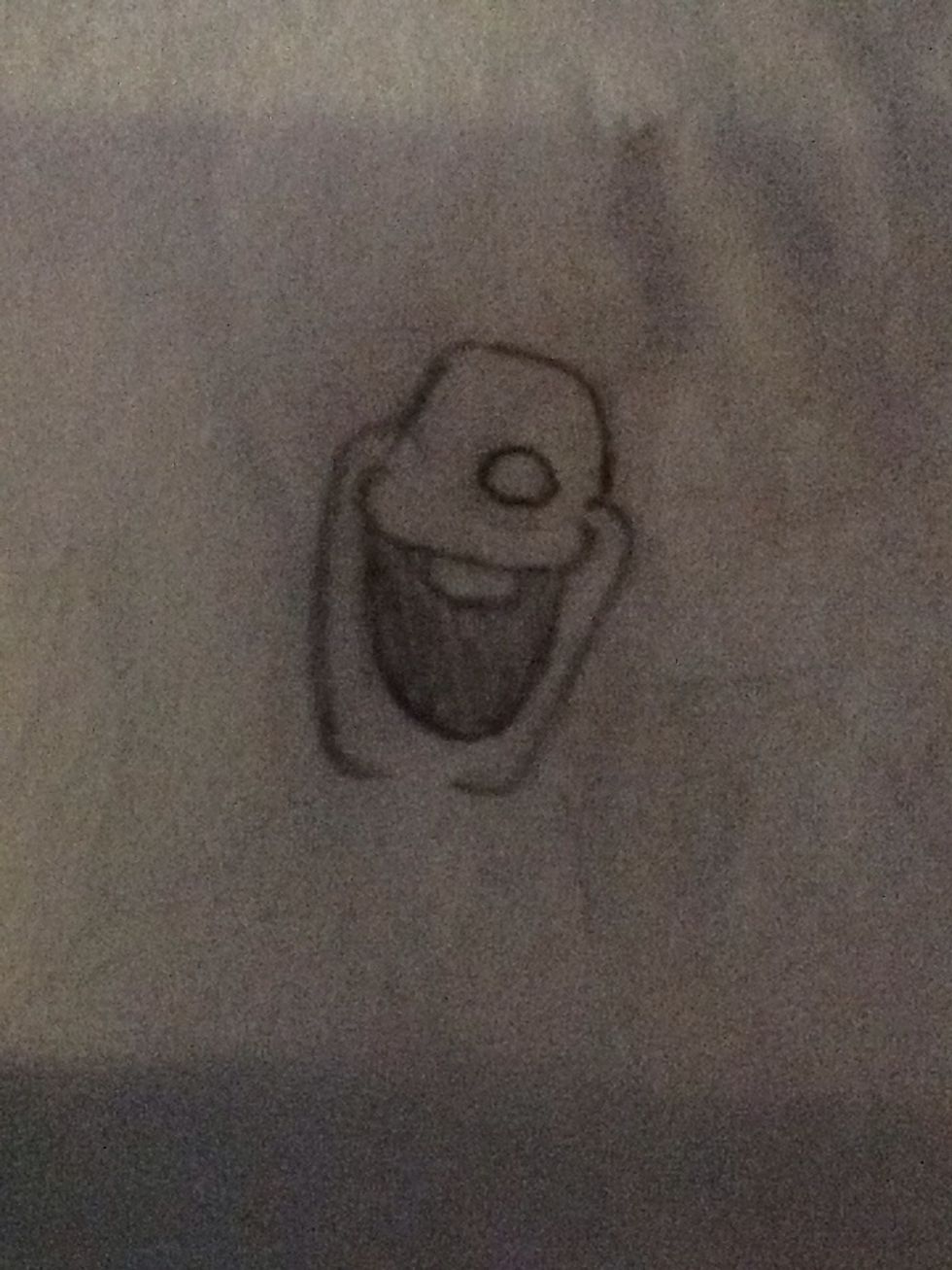 Draw an oval shape for his nose