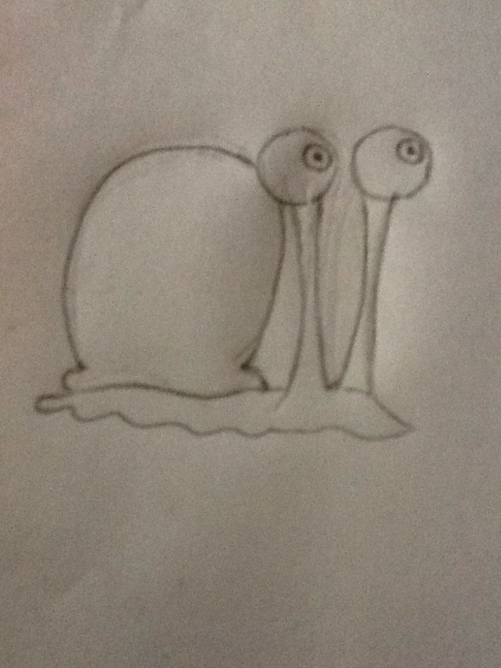 Draw an oval shape to finish off the shell.