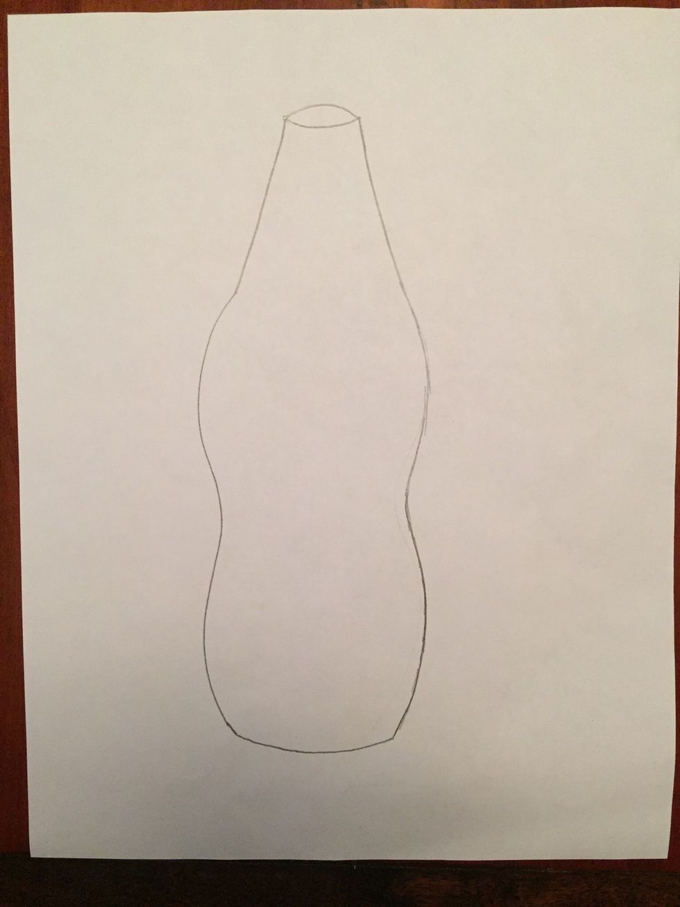Draw an upward curving line for your bottle opening.