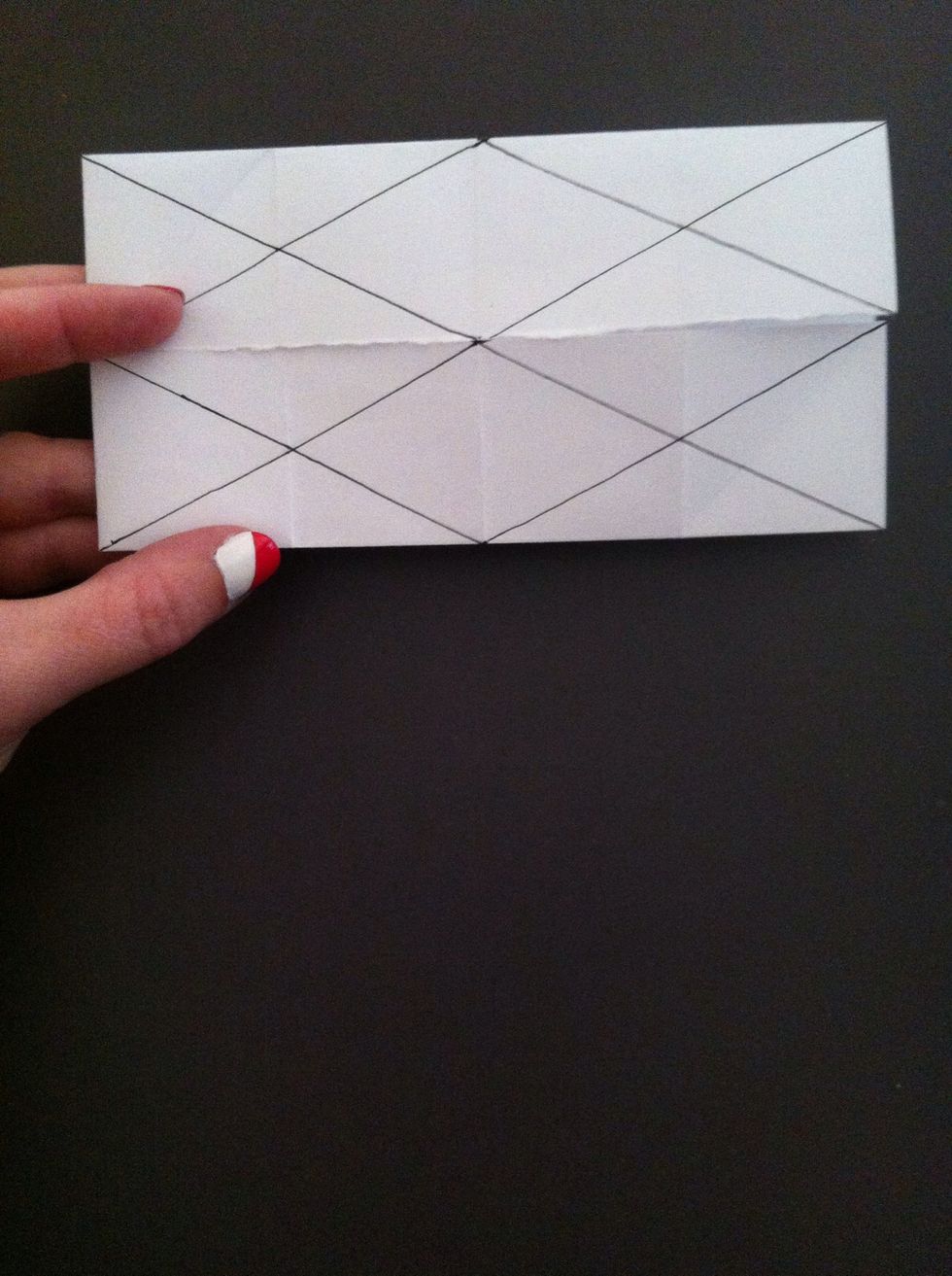 Draw an "X". Flip paper over & repeat.
