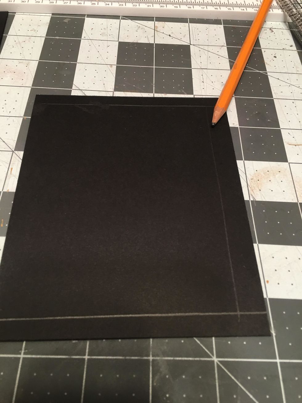 Draw another 1/4" placement line on the top edge as shown.